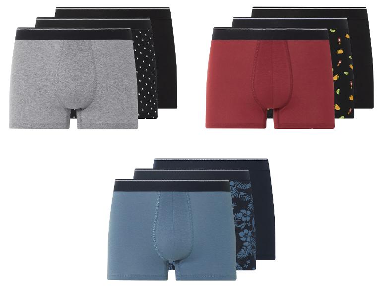 Pak heren boxershorts: grijs, rood, donkerblauw en prints.