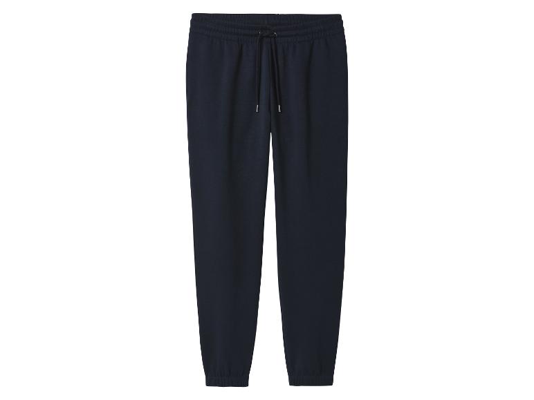 Donkerblauwe joggingbroek met trekkoord in de taille.