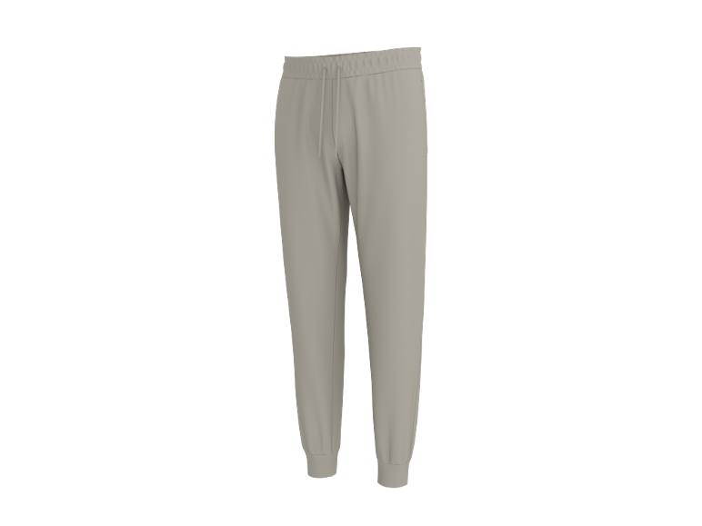 Beige joggingbroek met elastische tailleband en boorden.