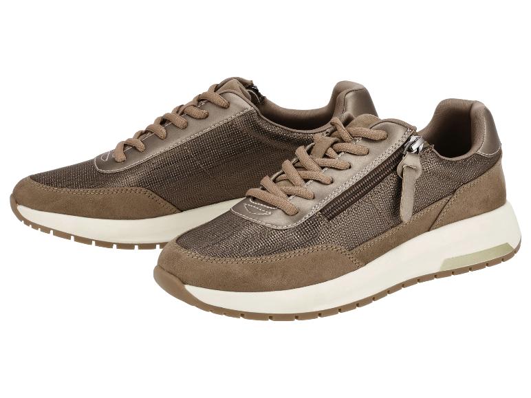 Paar bruine en beige damessneakers met veters en zijritsen