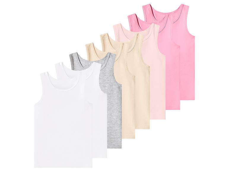 Zeven dames tanktops in wit, grijs, beige, lichtroze en roze