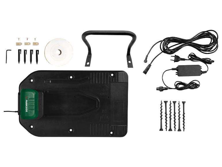 Parkside robotmaaier installatiekit met laadstation, kabels en accessoires.