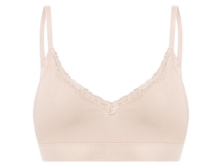 Beige draadloze beha met kanten rand en geribbelde textuur.