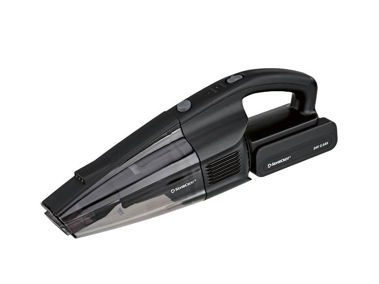 Zwarte draadloze kruimelzuiger met transparant stofreservoir en 24V 2.5Ah accu.