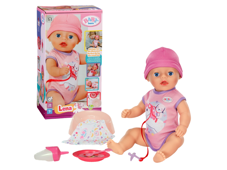Roze pop met accessoires en verpakking, perfect voor kleine kinderen.