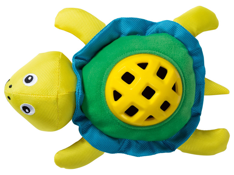 Een groene schildpad met een gele bal erin.
