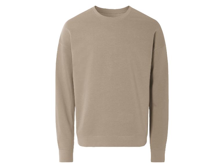 Beige longsleeve trui met ronde hals.