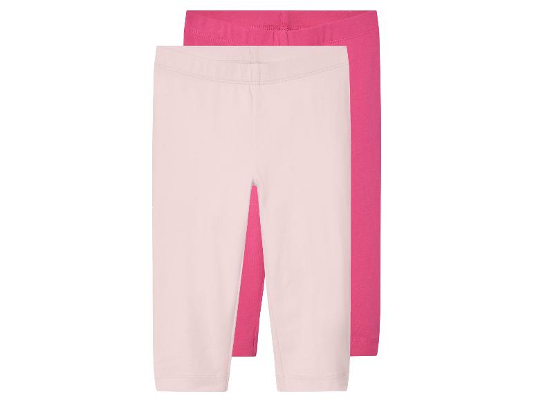 Twee paar meisjes leggings in roze en lichtroze.