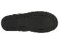 Zool van een zwarte winterlaars met antislip profiel.