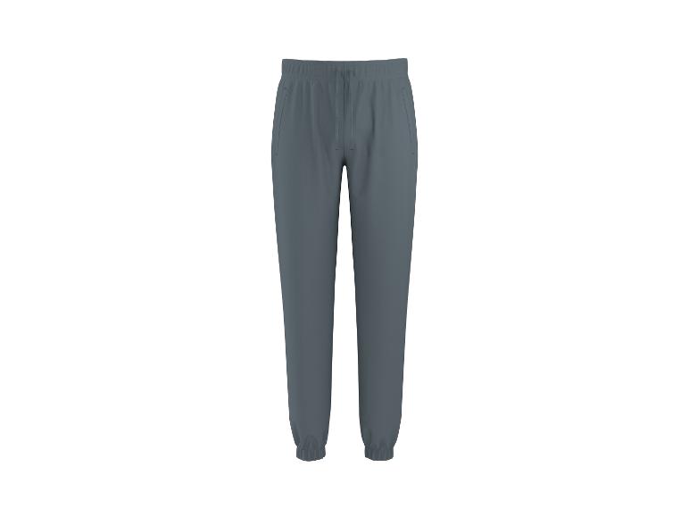 Eenvoudige donkergrijze joggingbroek met elastische tailleband en boorden.