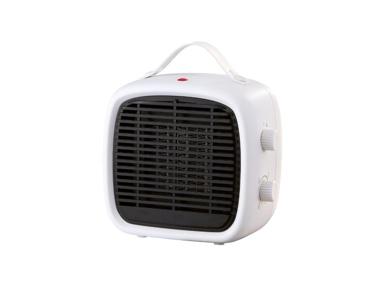 Witte draagbare keramische ventilatorkachel met handvat en bedieningsknoppen.