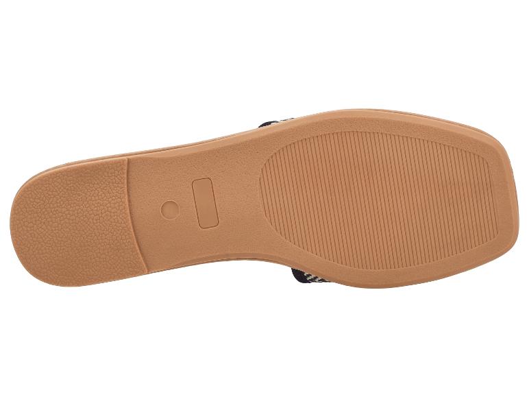 Bruine platte sandaalzool met antisliptextuur en designaccenten.