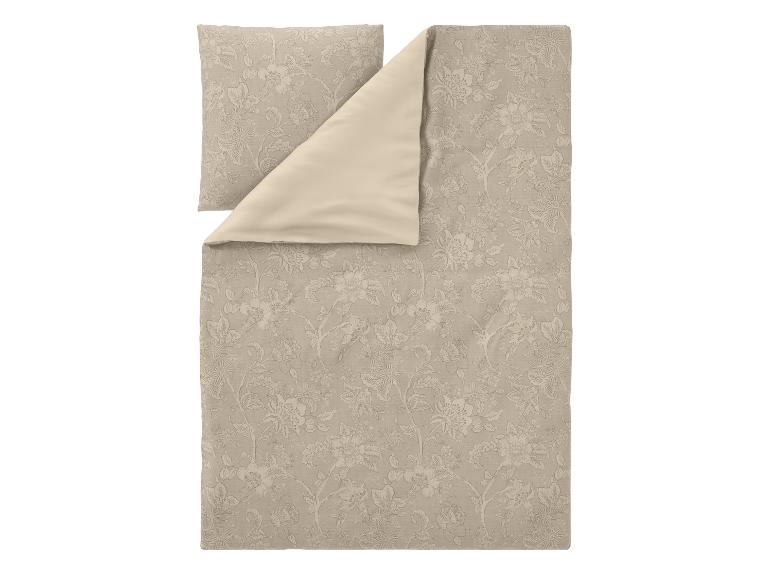 Beige dekbedovertrekset met bloemenpatroon en effen achterkant.