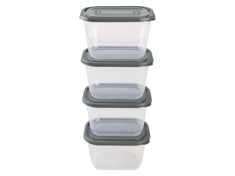 Stapelbare, transparante plastic opbergdozen met grijze deksels.