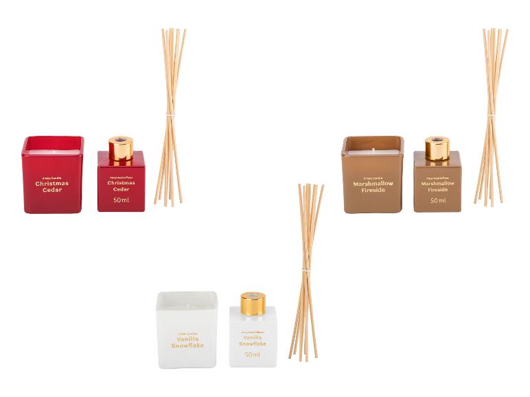 LIVARNO® kerstkaarsen en diffusers: 'Christmas Cedar', 'Marshmallow Fireside', 'Vanilla Snowflake'.