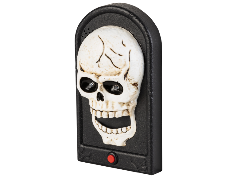 Halloween decoratie in de vorm van een schedel met lichtgevende ogen en rode knop.