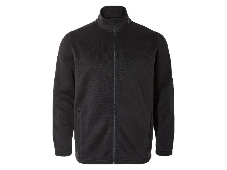 Een zwarte fleece trui met rits.