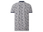 Een grijs poloshirt met blauwe palmbomenprint.