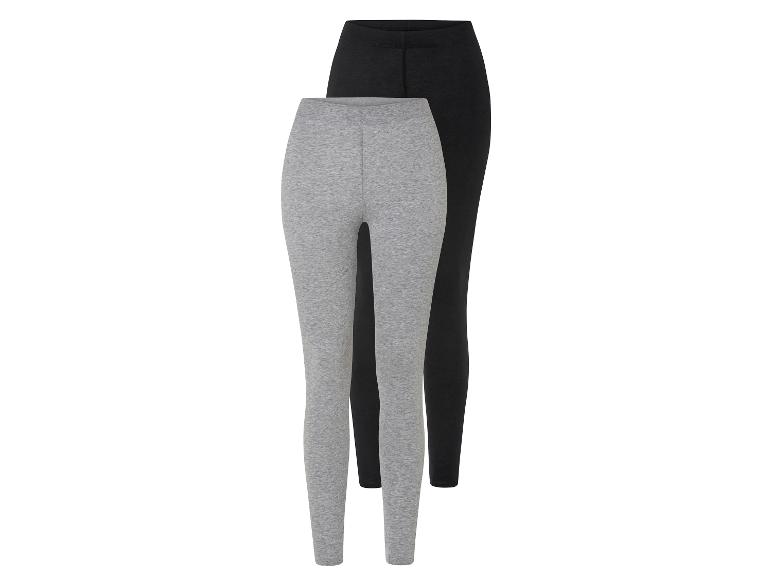 Twee paar leggings, een in grijs en een in zwart.
