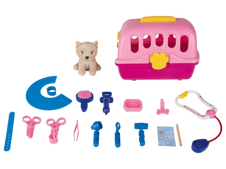 Speelgoeddierenartsset met knuffelhond, draagtas en accessoires.