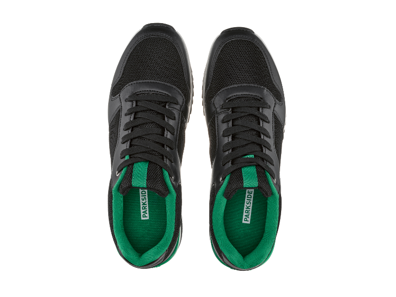Zwarte Parkside sneakers met groene accenten.