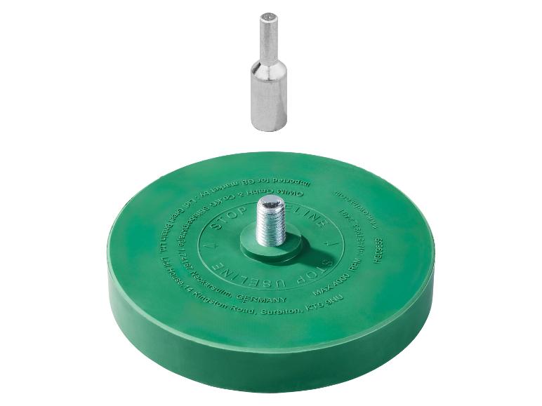 Groene schuurschijf met metalen spindel en veiligheidsinstructies.