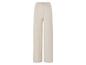 Beige wijde broek met elastische tailleband.
