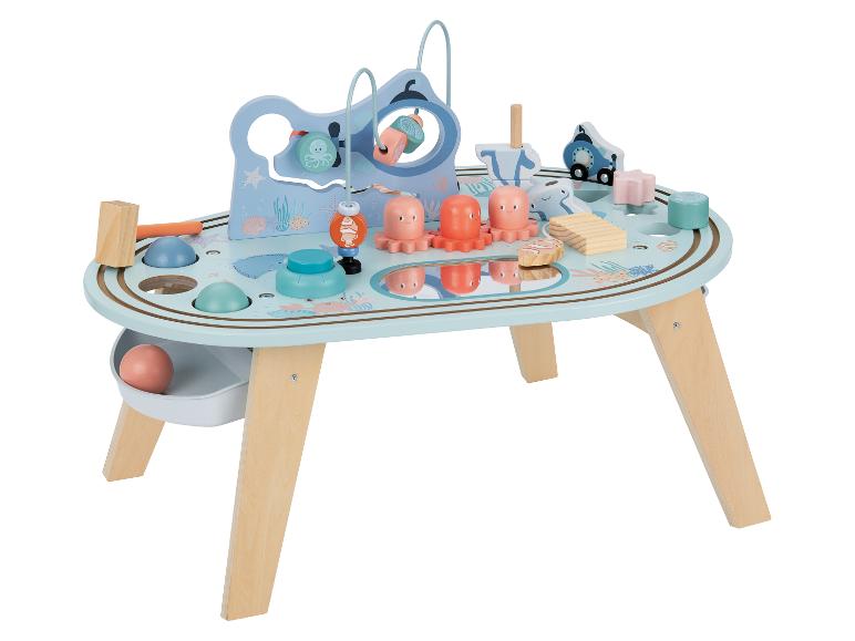 Houten kinderactiviteitentafel met maritiem thema en diverse spelletjes.