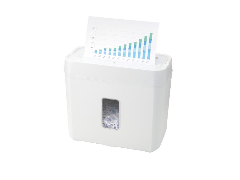 Witte papierversnipperaar met een grafiek die erin wordt gevoerd.