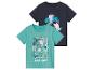 Twee Peppa Pig shirts voor kinderen: een groene met jungleprint en een donkerblauwe met palmbomen.
