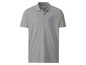 Een grijs poloshirt met een 'Manhattan'-logo.