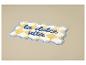 Badmat met geel-wit ruitpatroon en blauwe tekst 'la dolce vita'.