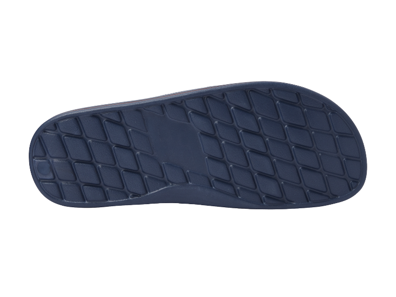 Onderkant van donkerblauwe slippers.