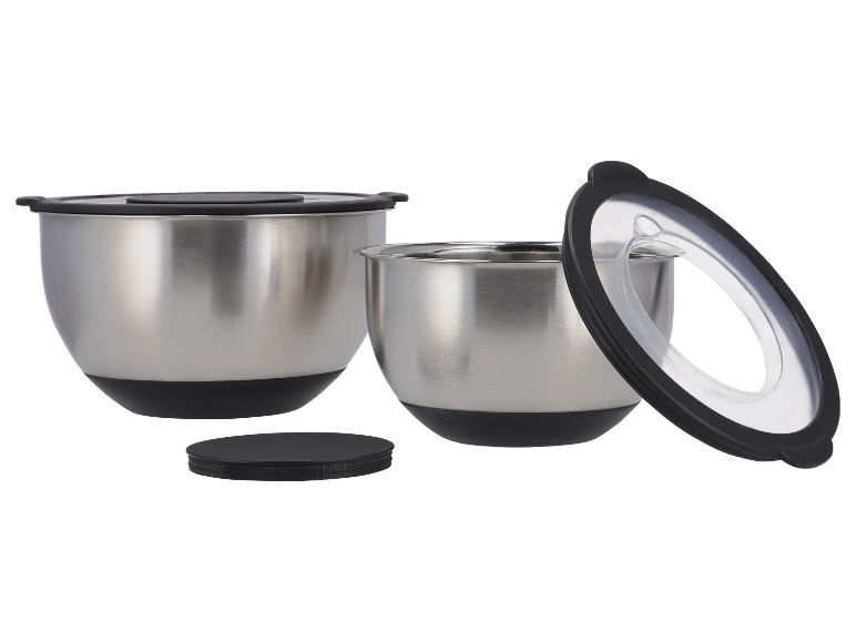 Twee roestvrijstalen kommen met deksels.