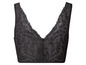 Zwarte bh met kant en bloemenprint.