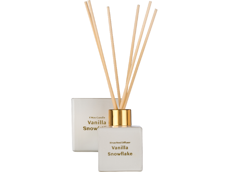 Rietdiffuser en kaars met vanille-sneeuwvlokgeur.