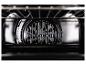 Oveninterieur met zichtbare heteluchtventilator en rooster.