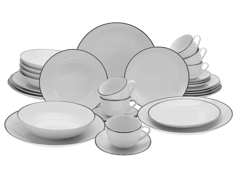 Wit serviesgoed met zwarte rand: borden, kommen en kopjes.