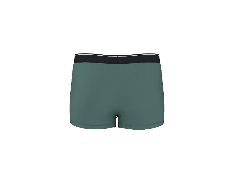 Groene boxershort met zwarte elastische tailleband en witte strepen.