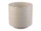 Ronde beige wandplantenbak met ophanggat.