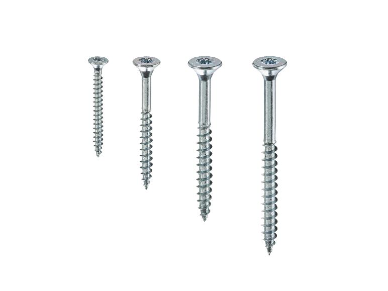 Vier zilverkleurige houtschroeven in verschillende maten met Torx-kop.