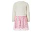 Kinderjurk met lange mouwen, crèmekleurige top en roze rok met glittersterren.