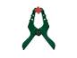 Een groene veerklem met een rood handvat, op een witte achtergrond.