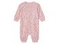 Roze baby romper met drukknoopjes, dieren- en sterrentjesprint.