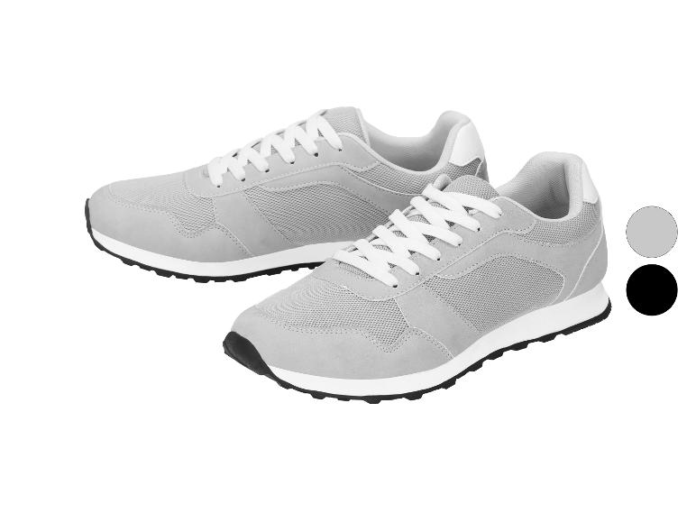 Twee grijze sportschoenen met witte veters en zwarte zolen, met kleuropties.