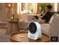 Witte tafelverwarming met afstandsbediening in een gezellige woonkamer.