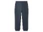 Eenvoudige donkerblauwe joggingbroek met elastische tailleband en boorden.