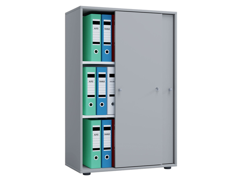 Een grijs metalen archiefkast met schuifdeuren, gevuld met kleurrijke ringbanden.