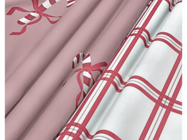 Kerstbeddengoed met zuurstokken en een rood-wit geruit patroon.