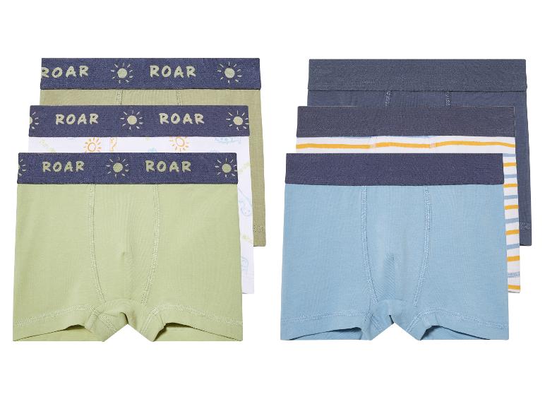 Een setje van drie jongensboxers met een print van een zon en de tekst 'Roar'
